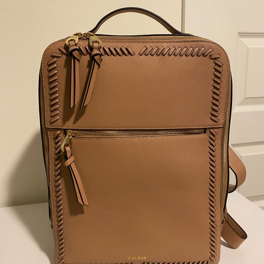 Calpak Brown/Rose gold Backpack with Braided Accents. Used twice!